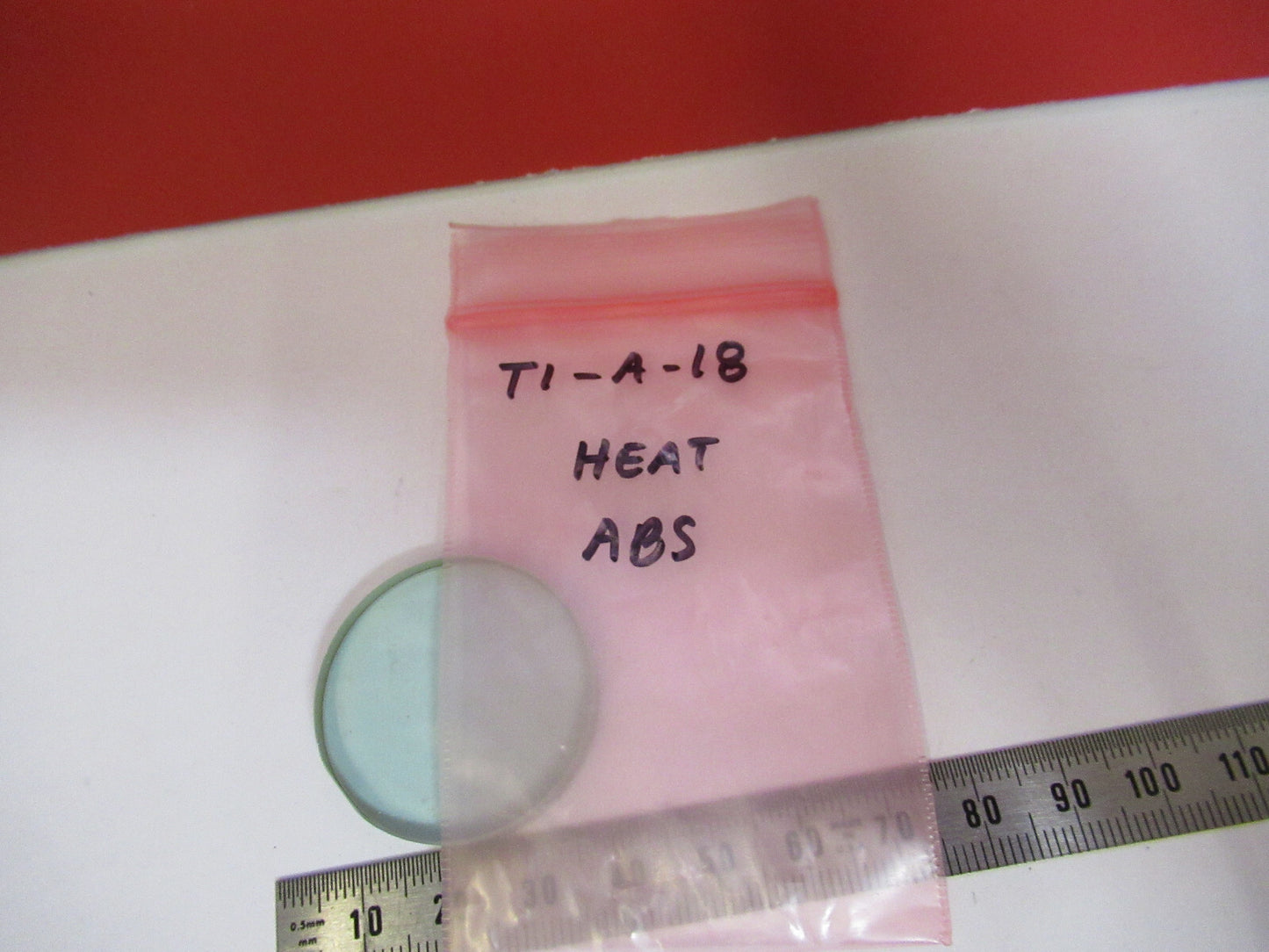 OPTICS HEAT ABSORBING FILTER GLASS MICROSCOPE PART OPTICAL AS PICTURED T1-A-18