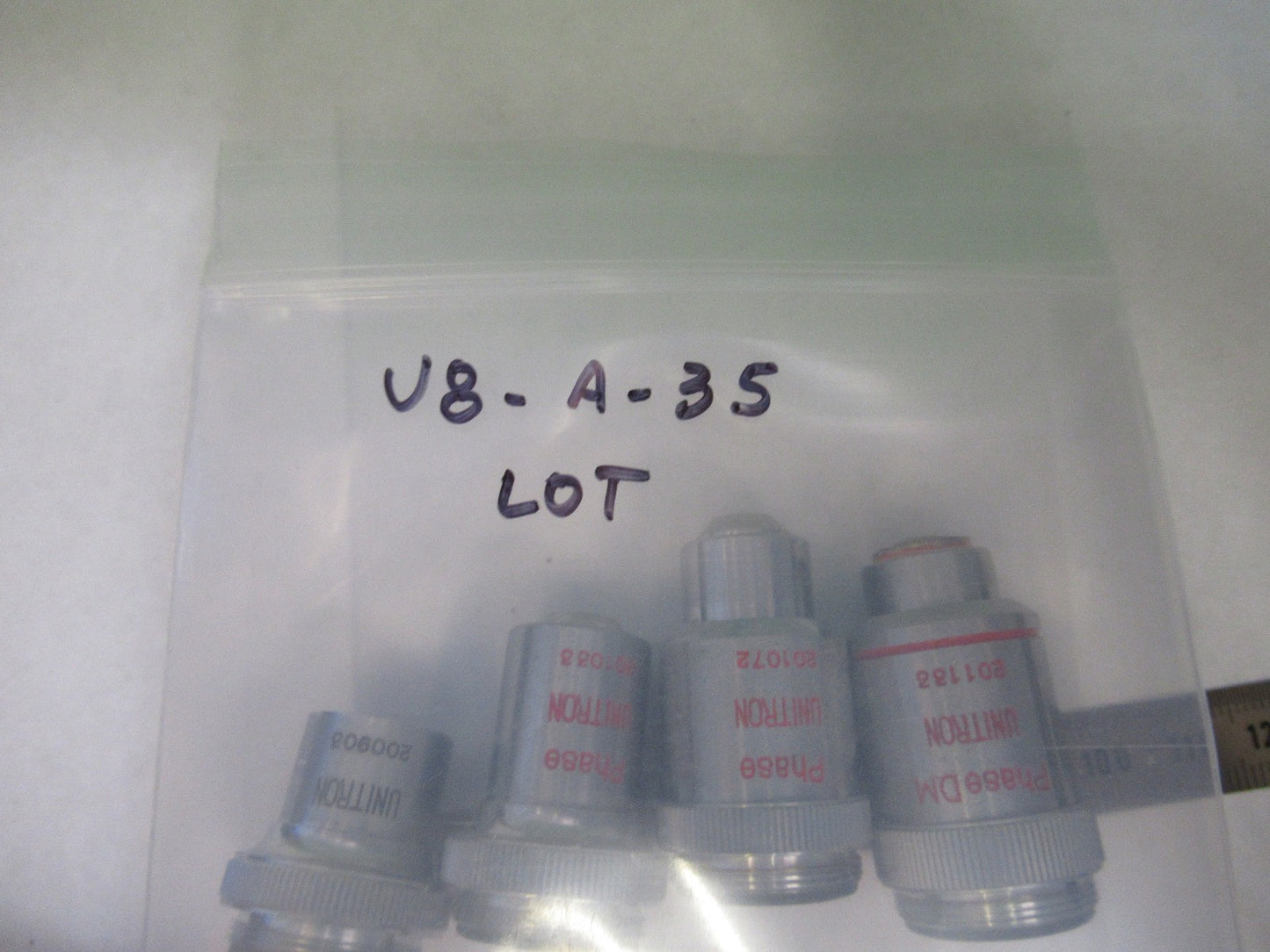 UNITRON JAPAN LOT OBJECTIVES 4 PIECES MICROSCOPE PART AS PICTURED U8-A-35