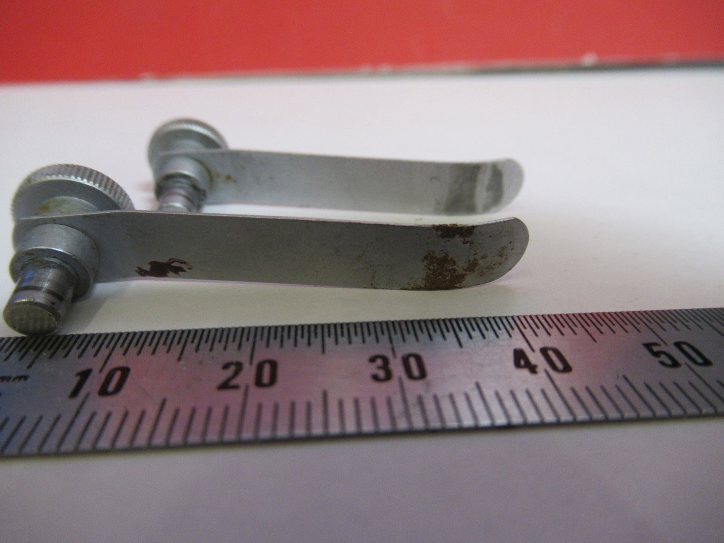 WILD HEERBRUGG SWISS M11 PAIR CLIPS  MICROSCOPE PART AS PICTURED V7-A-75