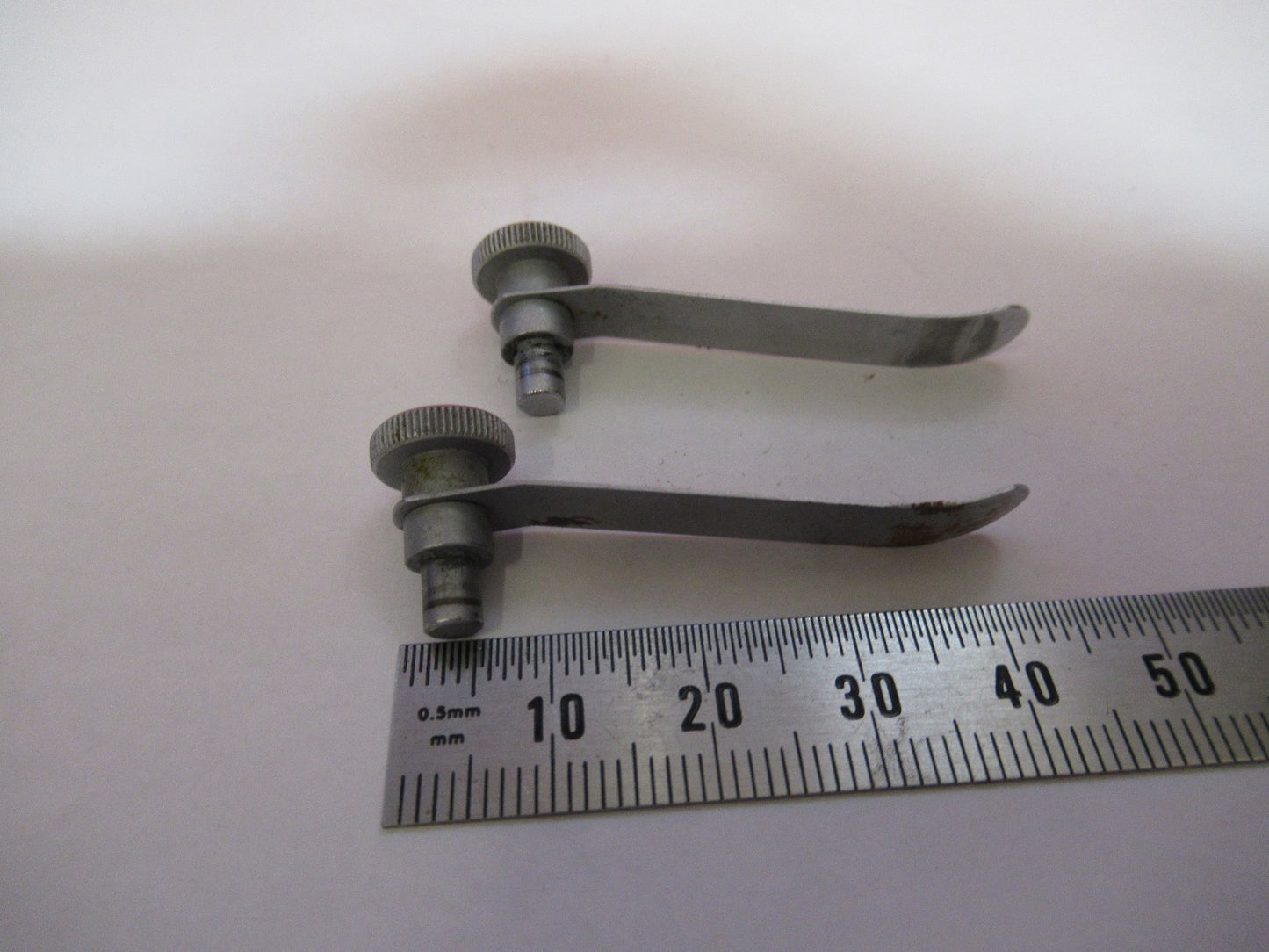 WILD HEERBRUGG SWISS M11 PAIR CLIPS  MICROSCOPE PART AS PICTURED V7-A-75