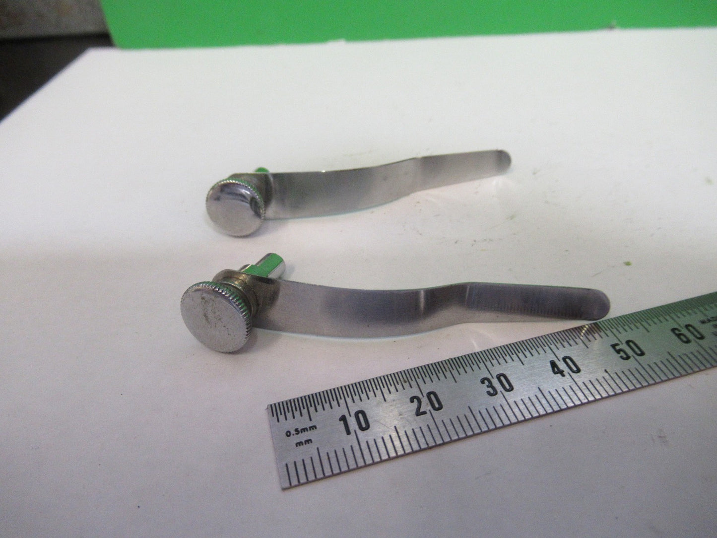 ANTIQUE PAIR OF CLIPS BAUSCH LOMB MICROSCOPE PART AS PICTURED U9-A-44