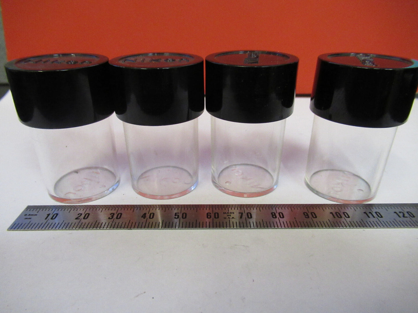 NIKON JAPAN LOT PLASTIC CANISTER OBJECTIVES MICROSCOPE PART AS PICTURED 6V-FT-97
