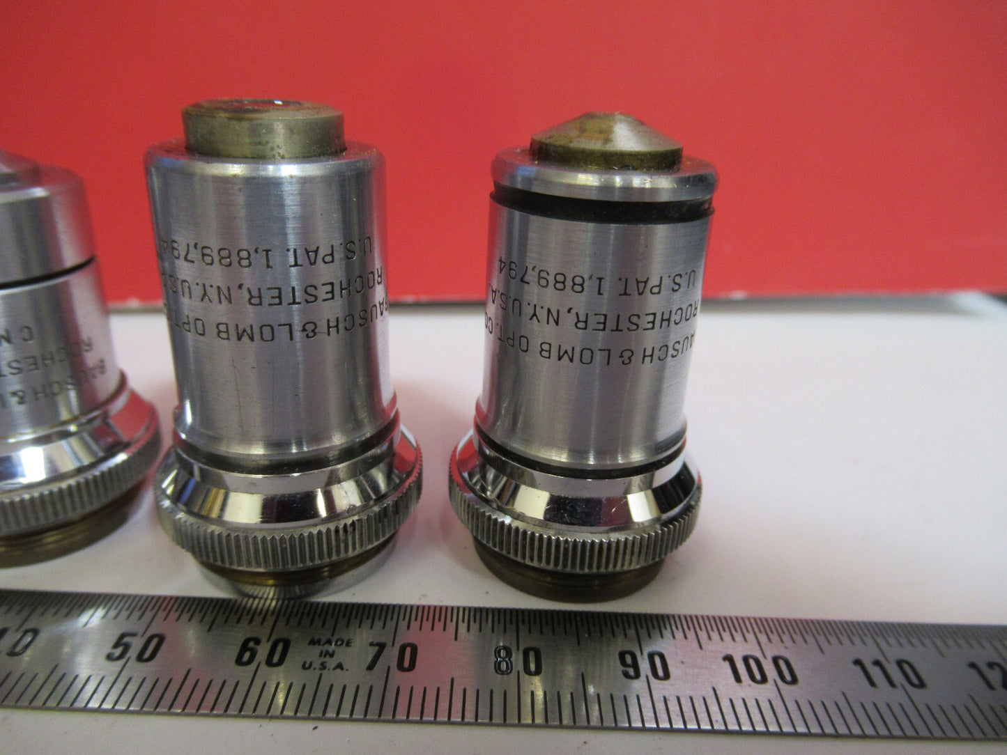 BAUSCH LOMB  LOT OBJECTIVES BRASS  4 PIECES MICROSCOPE PART AS PICTURED  T1-A-49
