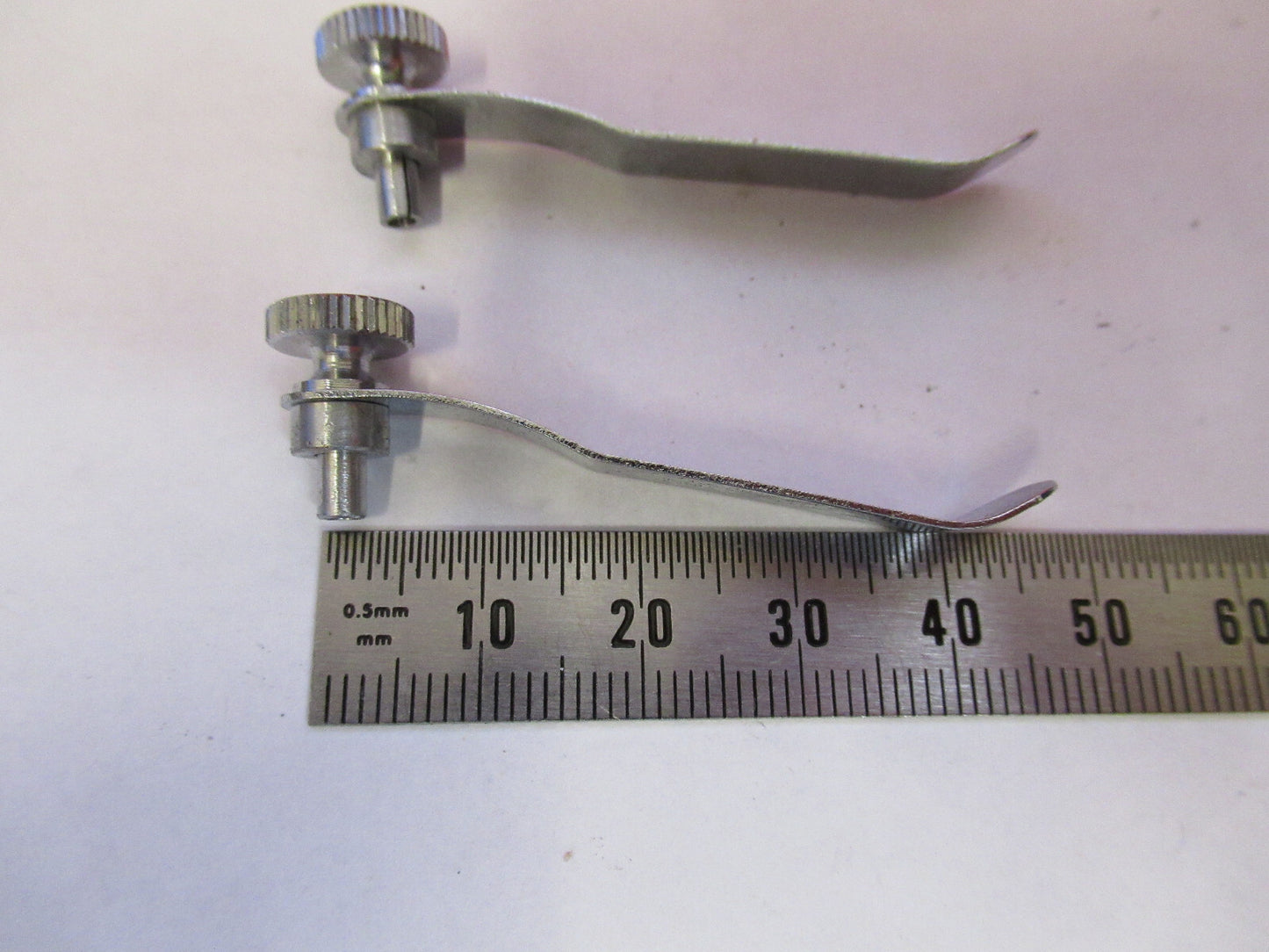 NIKON JAPAN PAIR CLIPS STAGE MICROSCOPE PART AS PICTURED X8-FT-79