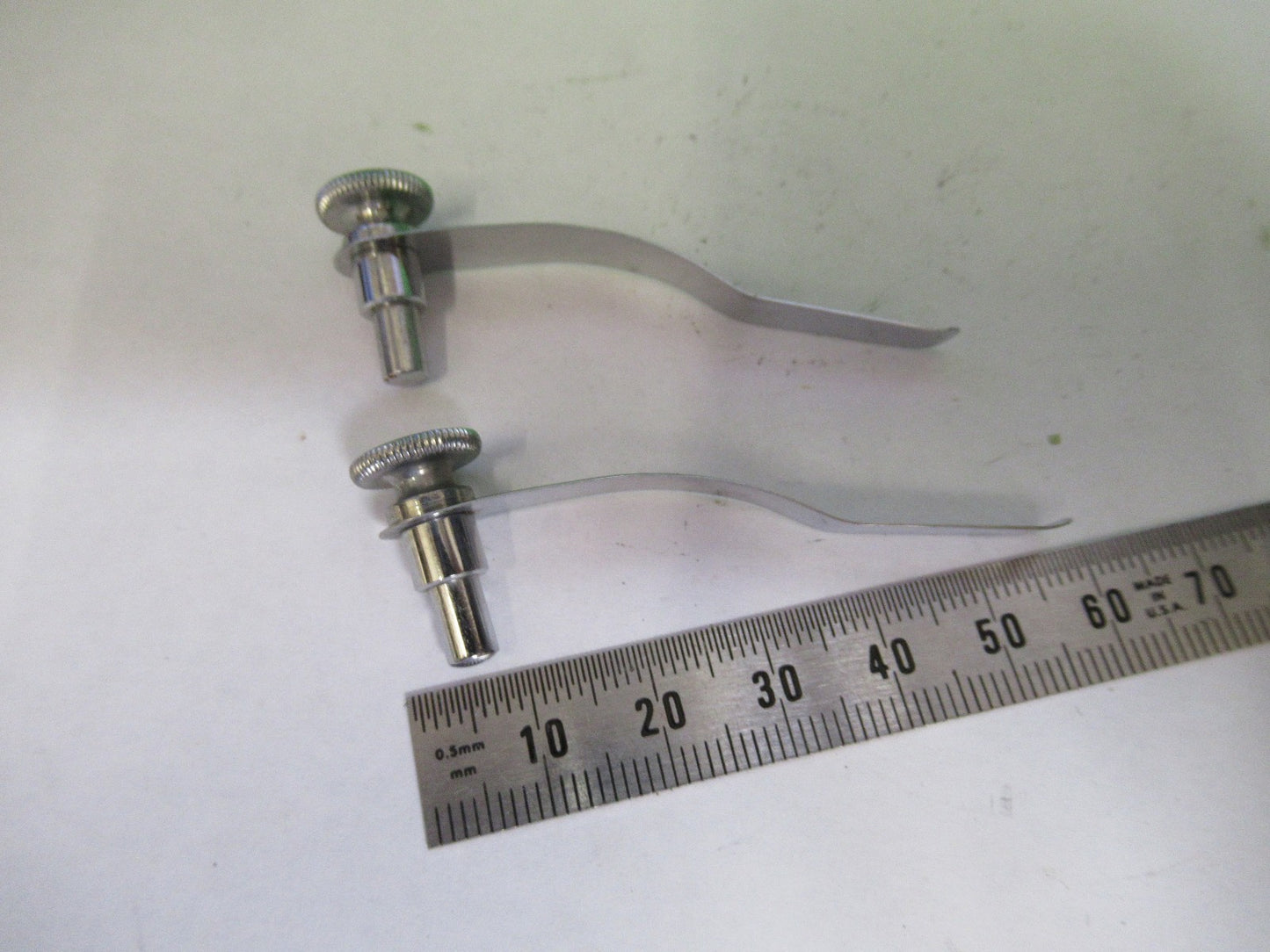 ANTIQUE PAIR OF CLIPS BAUSCH LOMB MICROSCOPE PART AS PICTURED U9-A-44